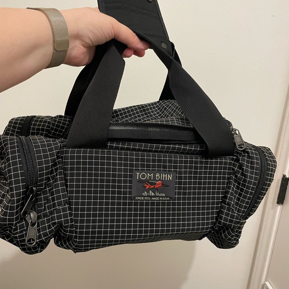 Tom Bihn Night Time Travel Duffel with camera inserts and shoulder strap